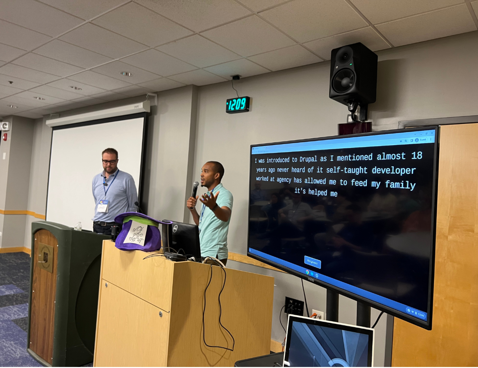 Fredric Mitchell, Principal at Bright Plum, Inc., interacting with Dries Buytaert, Founder and Project Lead of Drupal during an exclusive "fireside" chat at Midcamp 2025