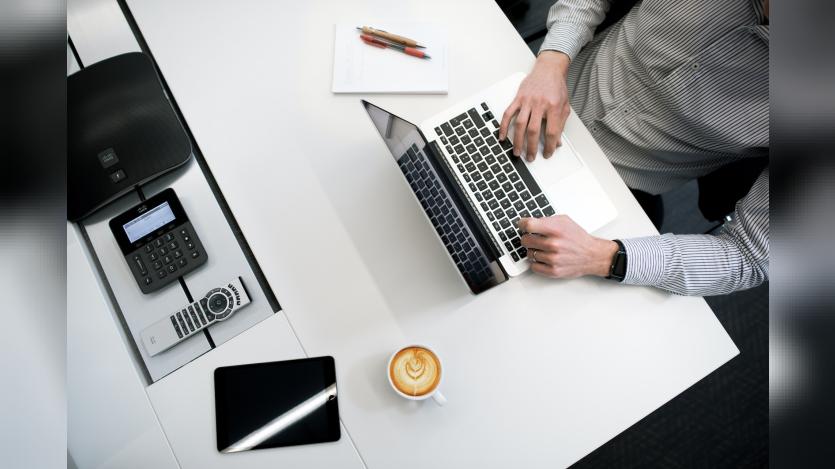 a person working in laptop