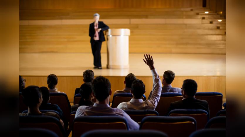 female business executive giving a speech