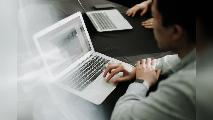 a person working in laptop
