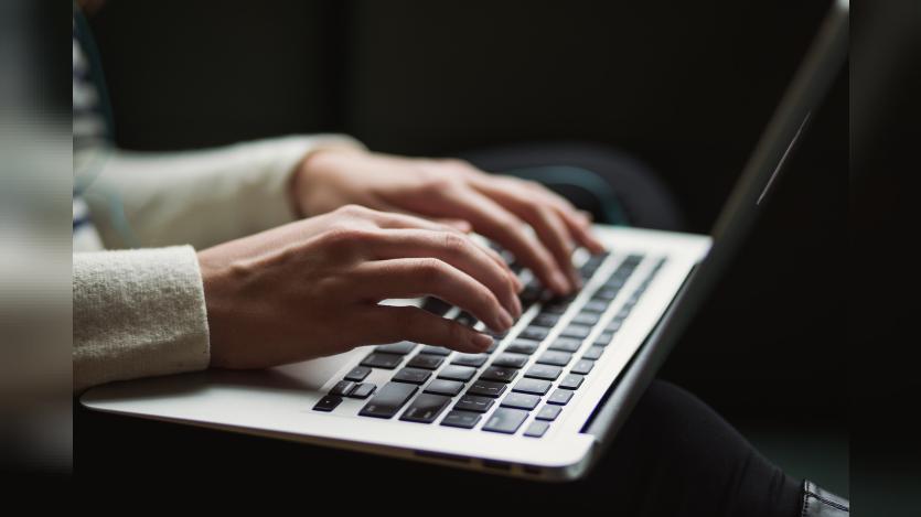 a person working in laptop