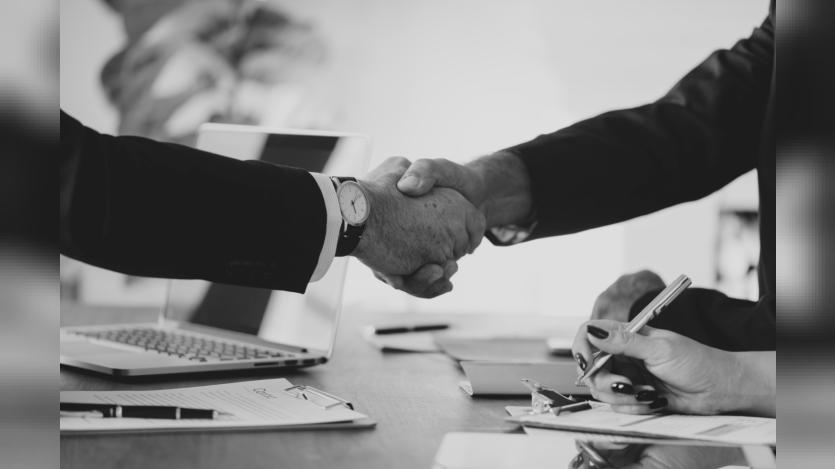 Two people shaking hands
