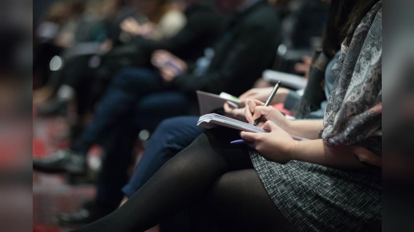 people taking notes during a session