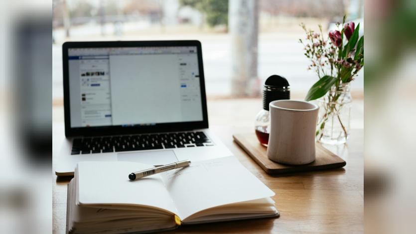 Laptop and notepad