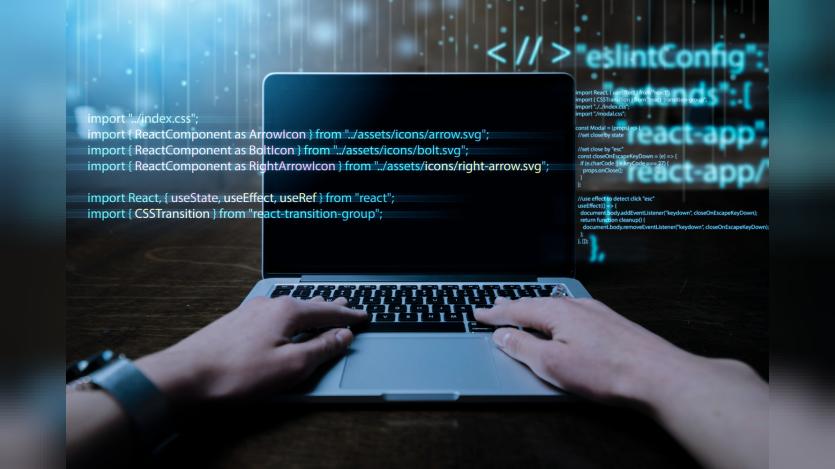 Programming background with person working with codes on computer