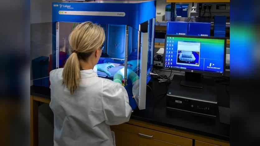 This image depicted a Centers for Disease Control and Prevention (CDC) scientist interacting with her Caliper LifeSciences’ Zephyr Molecular Biology Workstation, working with samples to be tested using a real-time PCR machine, known as a themocycler (see PHIL 22904), in order to identify the various types of poliovirus contained therein. The data from this analysis is stored in a computer, while the software further analyzes the data before being reviewed by a scientist.