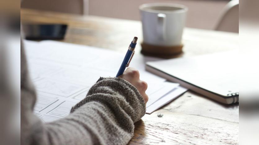 A girl writing notes