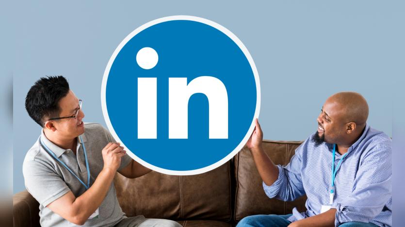 People holding a Linkedin logo