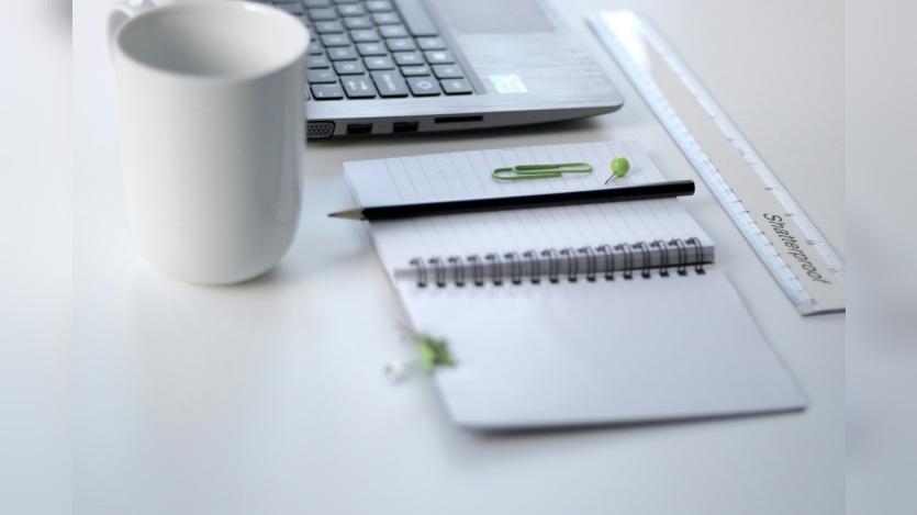 keyboard, mug and notepad