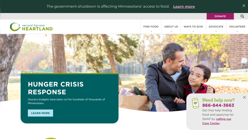 Second Harvest Heartland website highlighting hunger crisis response with a man and child sitting outdoors and a call to action to learn more