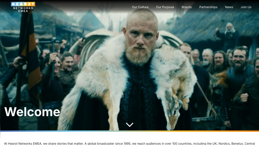 Homepage featuring a welcome message and a prominent hero image of a man in a fur coat.