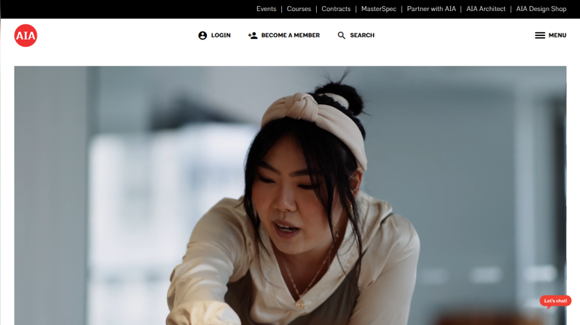 AIA website featuring a woman engaging in a creative activity, with navigation options above.