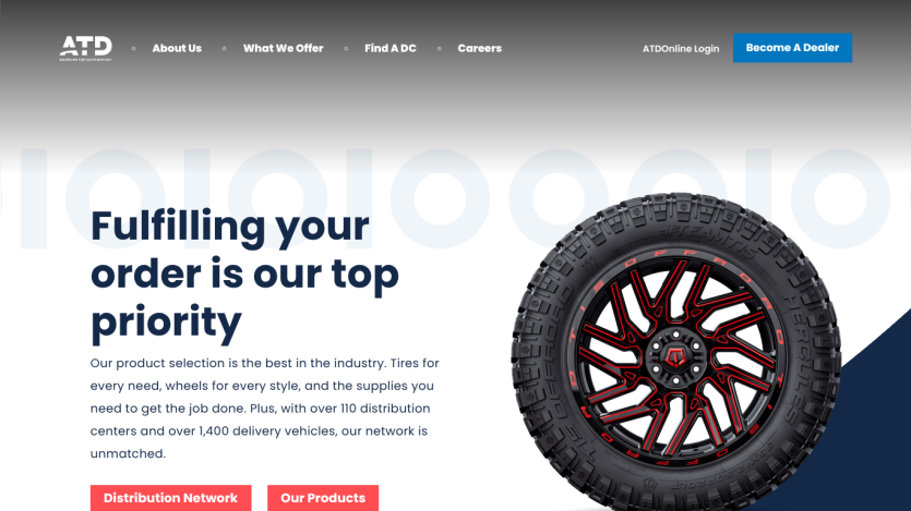 Homepage of American Tire Distributors with headline about order priority and image of off-road tire