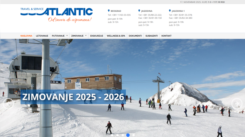Travel & Service Atlantic website with contact info and navigation, showing a ski resort scene for winter vacations 2025-2026