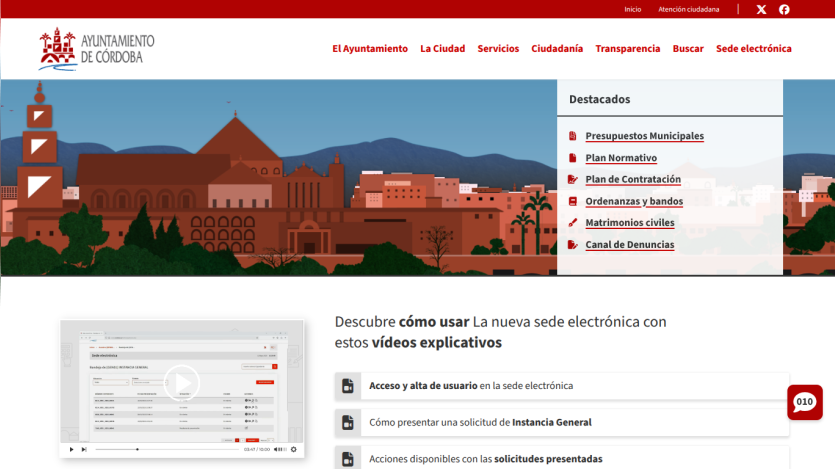 Ayuntamiento de Córdoba website with navigation menu, cityscape illustration, and links to municipal budgets and services videos