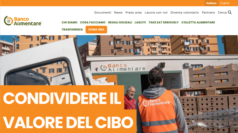 Banco Alimentare website with navigation and a hero image showing volunteers sharing food value