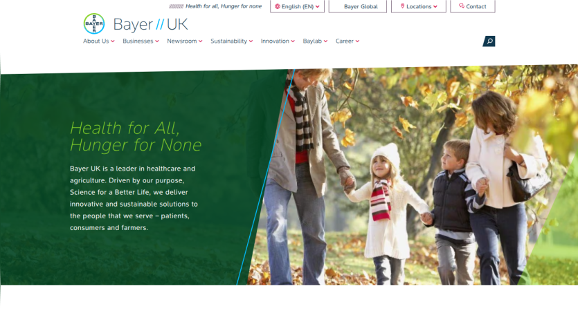 Bayer UK homepage with navigation menu and hero section promoting healthcare and agriculture solutions with family image