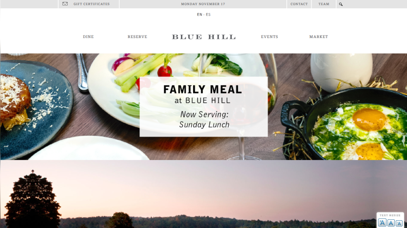 Blue Hill restaurant website showing family meal promotion for Sunday lunch with navigation links and date
