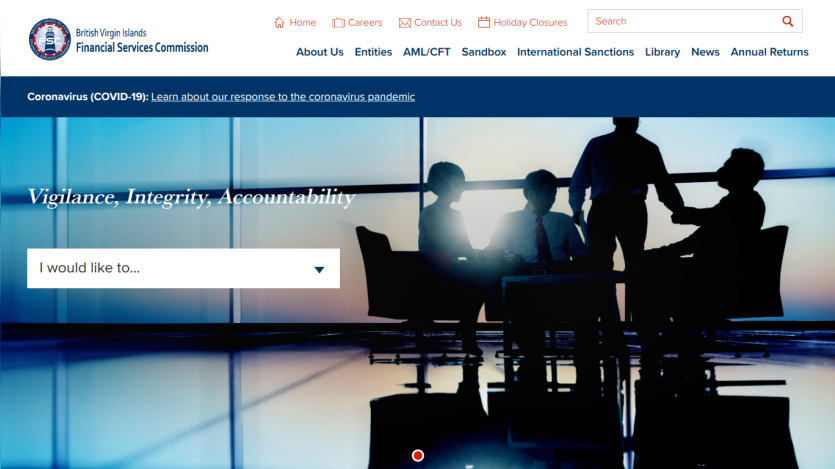 British Virgin Islands Financial Services Commission homepage with navigation links and a hero image showing business people meeting, featuring the slogan Vigilance, Integrity, Accountability