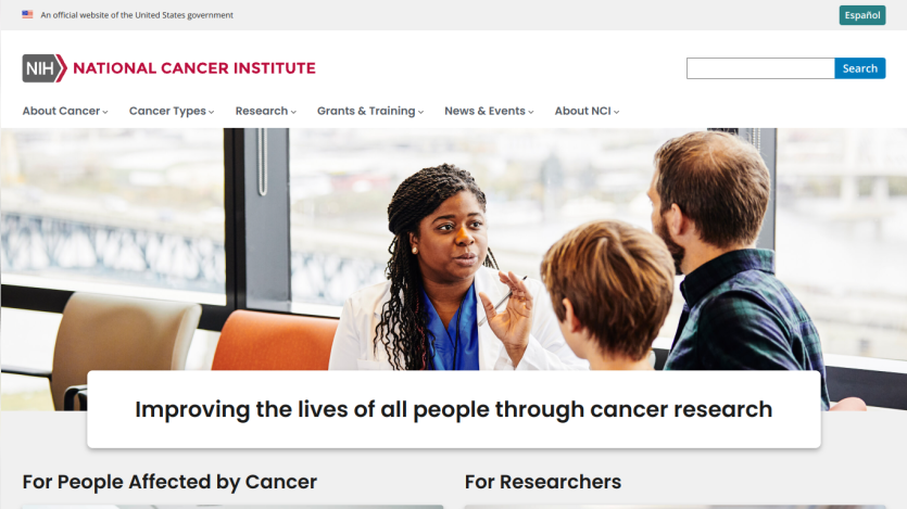 National Cancer Institute homepage featuring a diverse team discussing cancer research.