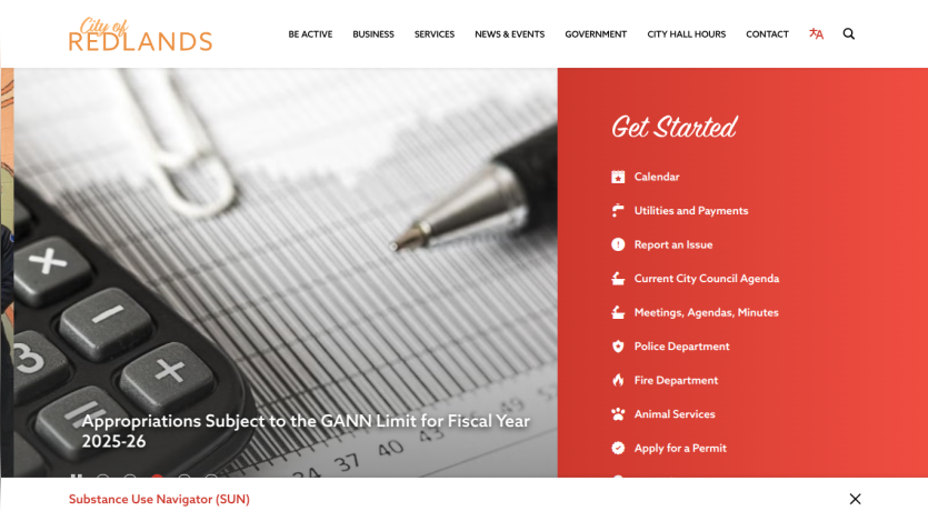City of Redlands website with navigation menu and Get Started links for city services and departments
