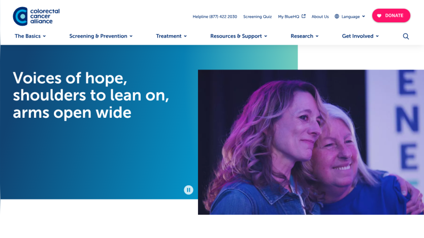 Colorectal Cancer Alliance homepage with navigation and a hero message about hope and support alongside an image of two women embracing