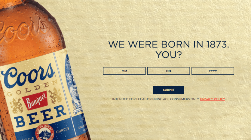 Coors beer promotional page with a vintage bottle image and a birth year verification form