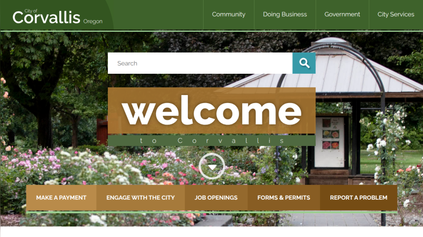 City of Corvallis Oregon website with navigation and welcome message over city building background
