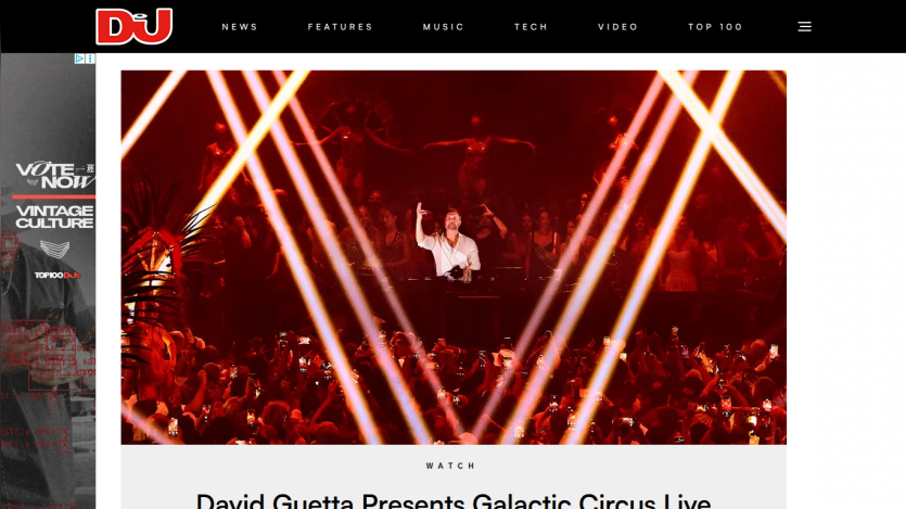 David Guetta performing at the Galactic Circus Live event with a vibrant crowd and lighting effects.