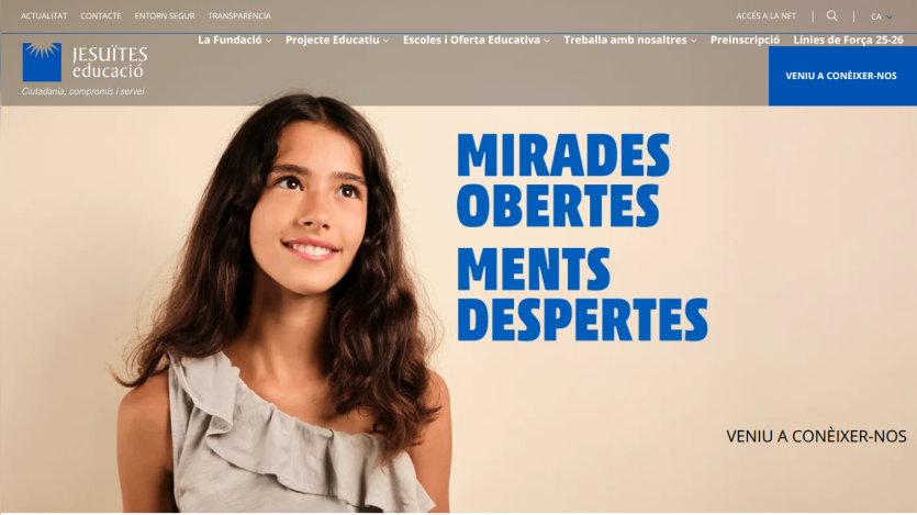 Jesuites Educació website with navigation menu and hero section featuring a smiling girl and text 'Mirades Obertes Ments Despertes'