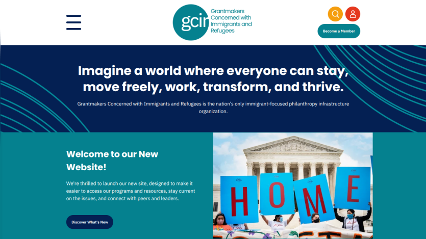 Grantmakers Concerned with Immigrants and Refugees homepage with mission statement and welcome message alongside image of people holding HOME signs