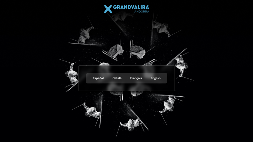 Grandvalira ski resort homepage with language options and skier images on black background