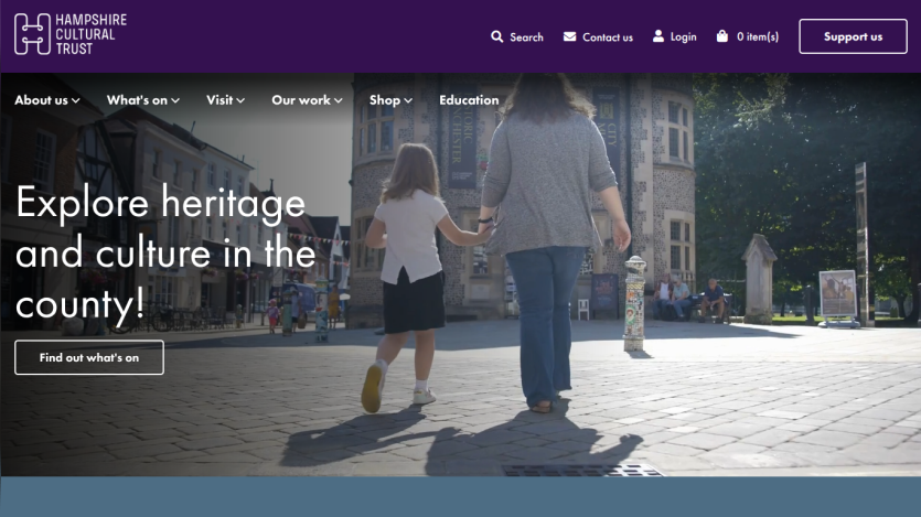 Hampshire Cultural Trust homepage with navigation and a family exploring heritage exhibits