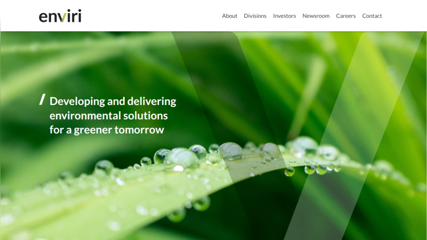 Enviri website with navigation links and tagline about developing environmental solutions for a greener tomorrow over a close-up of dew on a leaf.