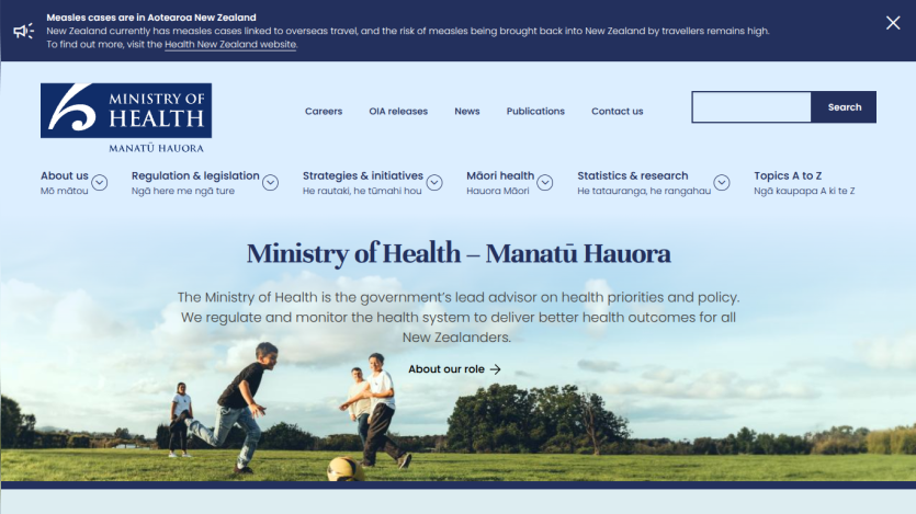 Ministry of Health New Zealand homepage with navigation links and a hero image of children playing soccer outdoors