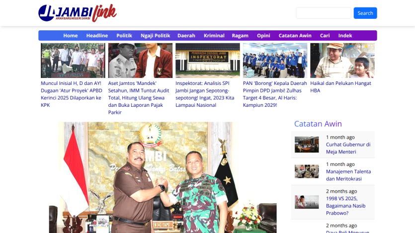 News website Jambi Link with navigation menu and multiple news articles including political and regional topics