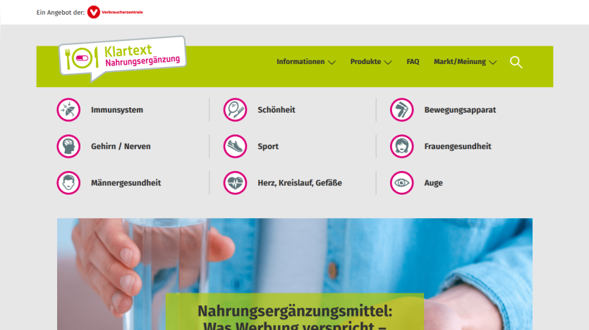 Website about dietary supplements with navigation for health topics and a hero image of a person holding a glass of water