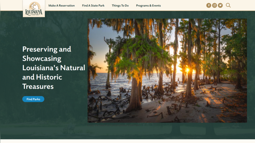 Louisiana State Parks homepage with navigation and a sunset view of a cypress swamp