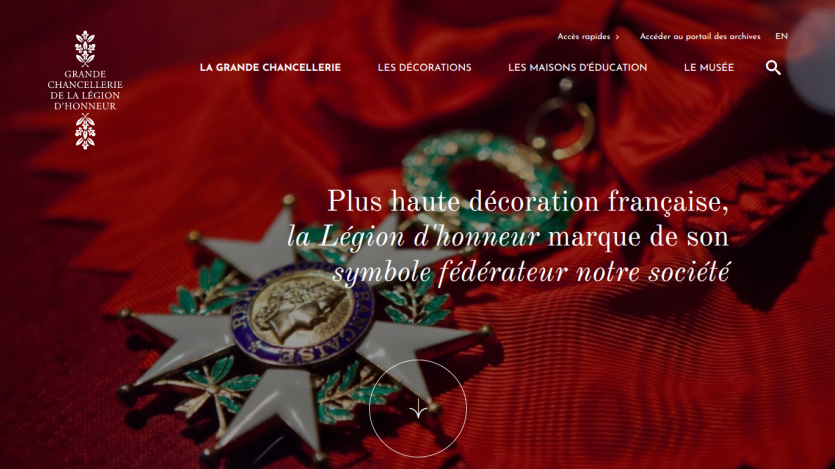 Website header and hero section featuring the French Legion of Honor medal with navigation links and a slogan about the highest French decoration.