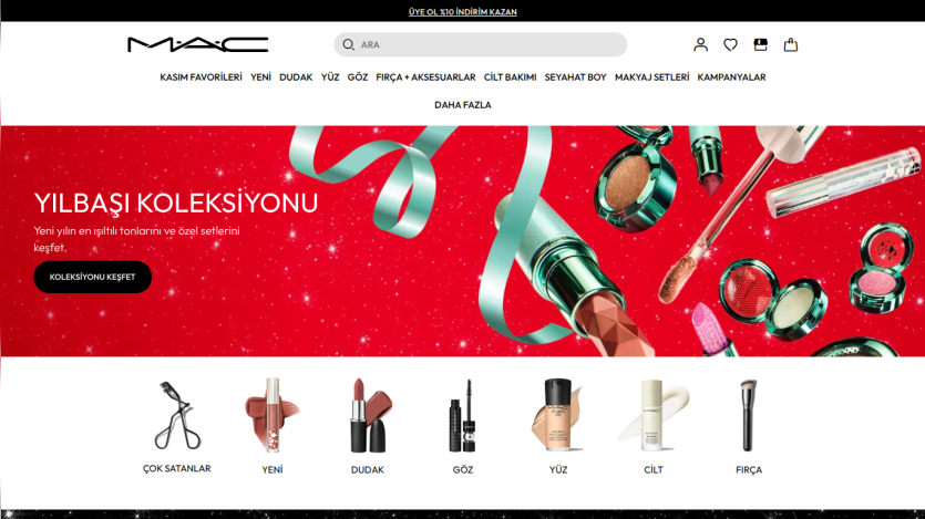 MAC Cosmetics website showing the New Year collection with red background, ribbon, and makeup products