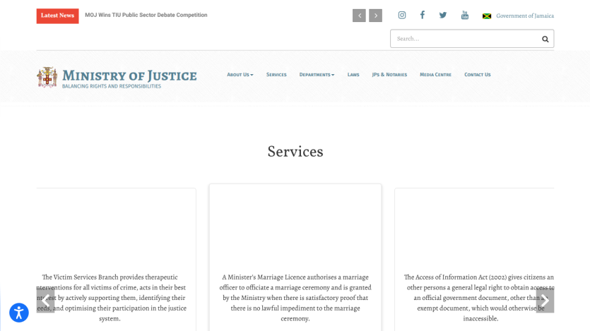 Ministry of Justice website header with navigation and hero image of two men in suits, text Ministry of Justice and View Details button