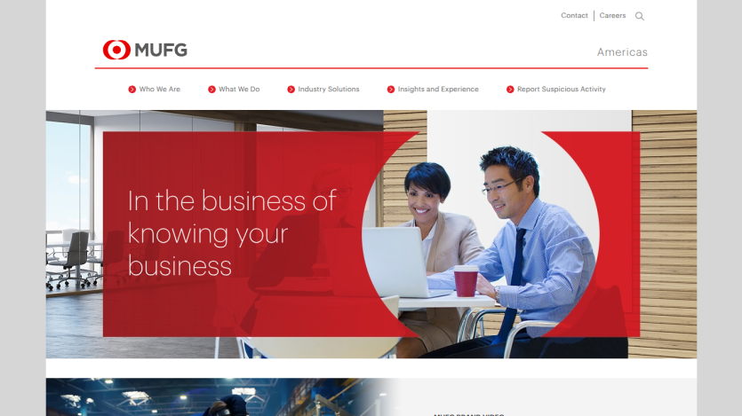 Homepage of MUFG featuring two professionals working together with a tagline about business knowledge.