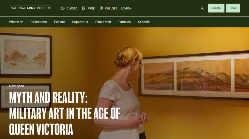 Exhibition title 'Myth and Reality: Military Art in the Age of Queen Victoria' with a visitor in an art gallery.