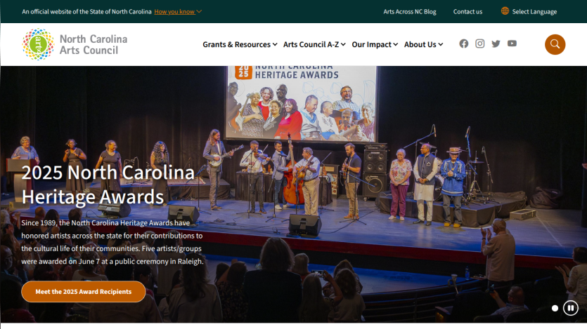 North Carolina Arts Council homepage featuring 2025 Heritage Awards announcement with event photo and navigation menu