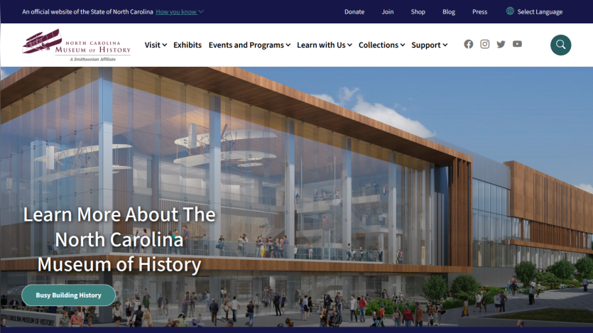 North Carolina Museum of History website with navigation and a large glass building image inviting to learn more