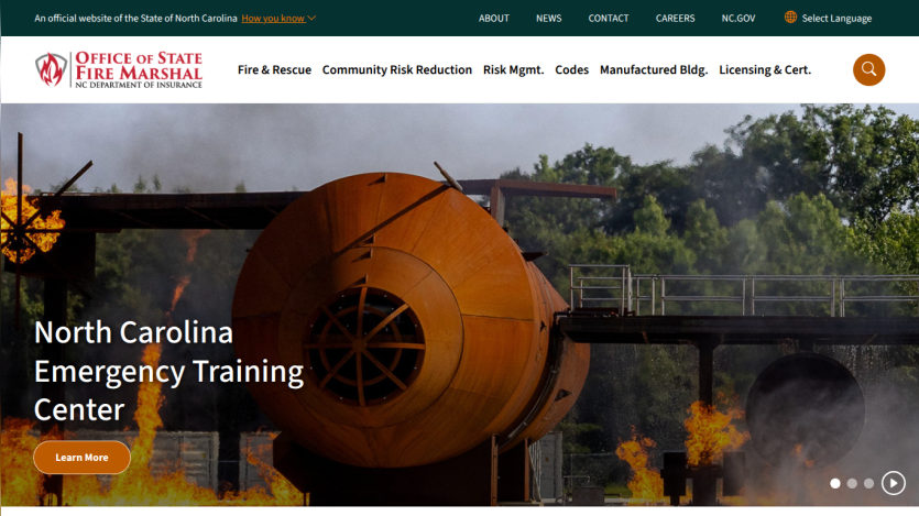 North Carolina Emergency Training Center homepage with fire training equipment and navigation menu
