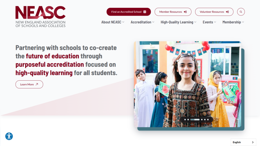 NEASC homepage with mission statement on education accreditation and a hero image of children holding artwork