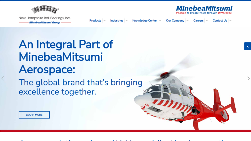 New Hampshire Ball Bearings homepage highlighting aerospace sector with helicopter image and navigation menu