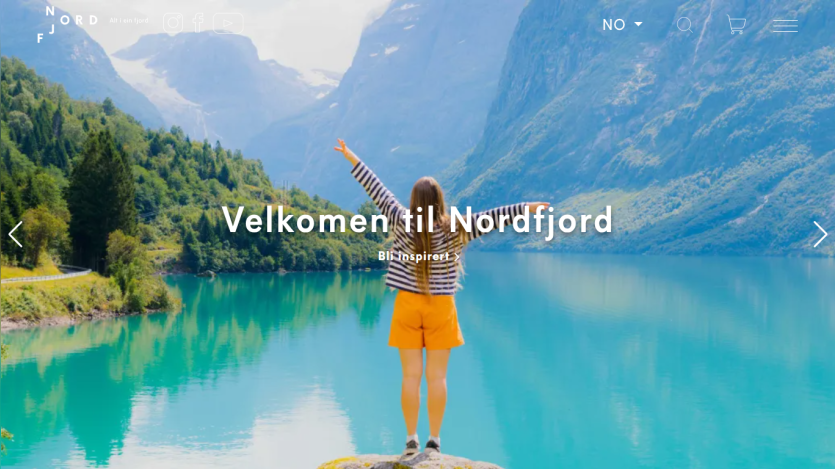 Travel website welcoming visitors to Nordfjord with a scenic fjord and mountains background