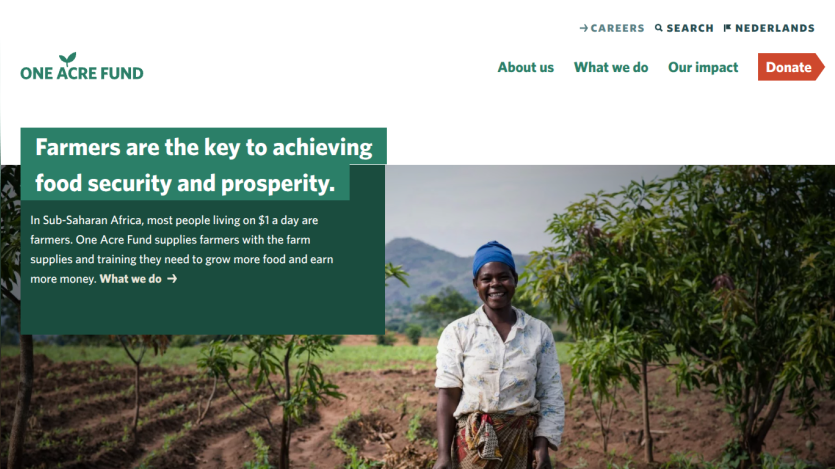 One Acre Fund homepage highlighting farmers' role in food security with a smiling farmer in a field and navigation links